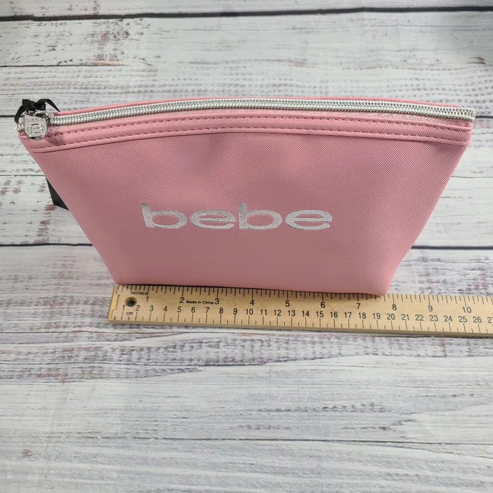 Bebe Pink Cosmetic Bag Sleek Design Zipper Closure With Two 1.6 Oz Bottles NWT